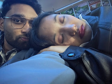 Her resting on his shoulder