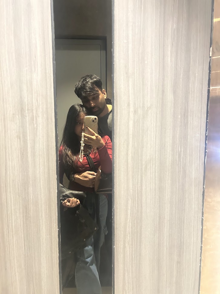 Mirror selfie together in a changing room